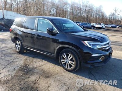Czwarte zdjęcie samochodu z boku: 2018 HONDA PILOT EXL VIN:5FNYF6H65JB057701 - miniatura
