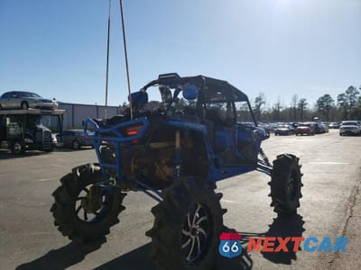 Czwarte zdjęcie samochodu z boku: 2015 POLARIS RZR XP 4 1000 EPS VIN:3NSVFE992FF369132 - miniatura