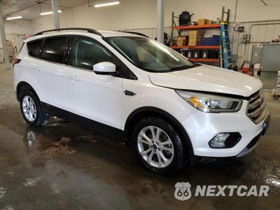 Czwarte zdjęcie samochodu z boku: 2017 FORD ESCAPE SE VIN:1FMCU9GD2HUA84059 - miniatura