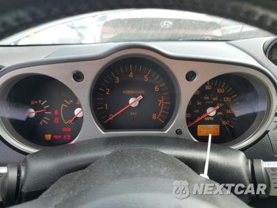 Zdjęcie 9 z 12 samochodu: 2004 NISSAN 350Z COUPE VIN:JN1AZ34D74M100753 - miniatura
