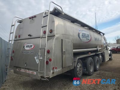 Czwarte zdjęcie samochodu z boku: 2020 KENWORTH CONSTRUCTION T880 VIN:1NKZXPEX3LJ370809 - miniatura