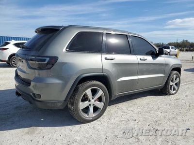 Trzecie zdjęcie samochodu z tyłu: 2012 JEEP GRAND CHEROKEE LAREDO VIN:1C4RJEAG8CC328234 - miniatura