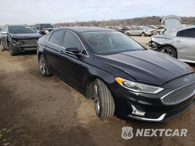 Czwarte zdjęcie samochodu z boku: 2020 FORD FUSION TITANIUM VIN:3FA6P0D99LR130982 - miniatura