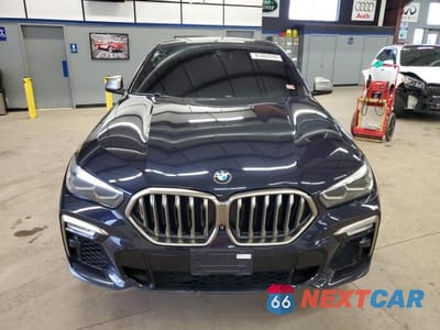 Piąte zdjęcie samochodu w środku: 2020 BMW X6 M50I VIN:5UXCY8C05L9B64765 - miniatura