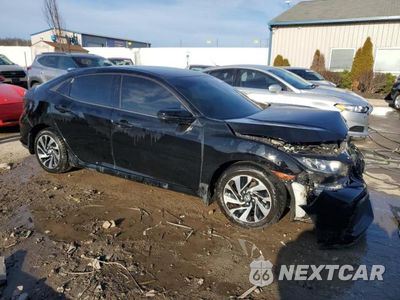 Czwarte zdjęcie samochodu z boku: 2018 HONDA CIVIC LX VIN:SHHFK7H2XJU220718 - miniatura