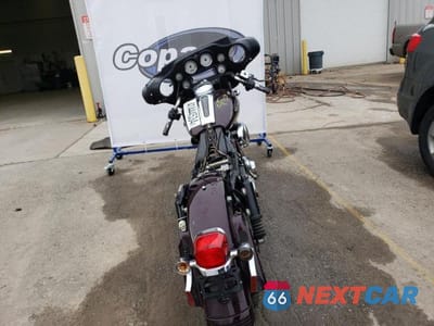 Czwarte zdjęcie samochodu z boku: 2006 HARLEY-DAVIDSON FLHXI VIN:1HD1KBW1X6Y669072 - miniatura