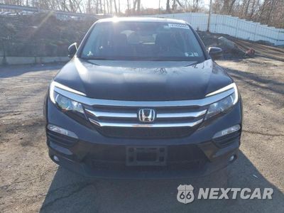 Piąte zdjęcie samochodu w środku: 2018 HONDA PILOT EXL VIN:5FNYF6H65JB057701 - miniatura