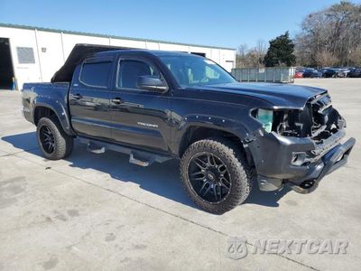 Czwarte zdjęcie samochodu z boku: 2017 TOYOTA TACOMA DOUBLE CAB VIN:5TFAZ5CN8HX038254 - miniatura