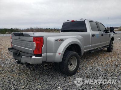 Czwarte zdjęcie samochodu z boku: 2021 FORD F350 SUPER DUTY VIN:1FT8W3DT3MEC25173 - miniatura