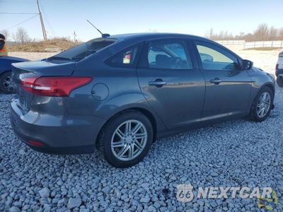 Trzecie zdjęcie samochodu z tyłu: 2016 FORD FOCUS SE VIN:1FADP3F26GL359696 - miniatura