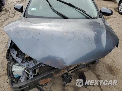 Zdjęcie 11 z 12 samochodu: 2017 TOYOTA COROLLA L VIN:5YFBURHE1HP673947 - miniatura