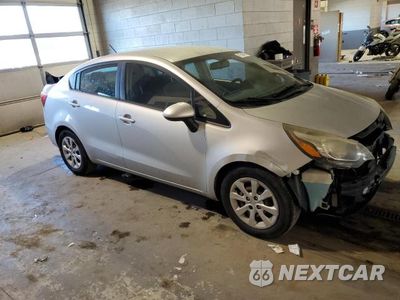 Czwarte zdjęcie samochodu z boku: 2014 KIA RIO LX VIN:KNADM4A34E6325838 - miniatura