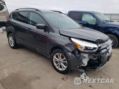 Czwarte zdjęcie samochodu z boku: 2018 FORD ESCAPE SEL VIN:1FMCU9H9XJUC15688 - miniatura