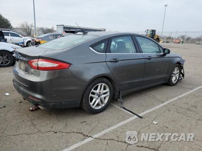 Trzecie zdjęcie samochodu z tyłu: 2016 FORD FUSION SE VIN:1FA6P0H77G5128682 - miniatura