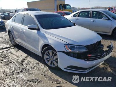 Czwarte zdjęcie samochodu z boku: 2016 VOLKSWAGEN JETTA SE VIN:3VWD67AJ0GM365590 - miniatura