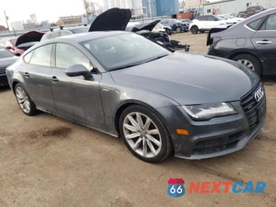 Czwarte zdjęcie samochodu z boku: 2014 AUDI A7 PRESTIGE VIN:WAU2GAFC3EN149019 - miniatura