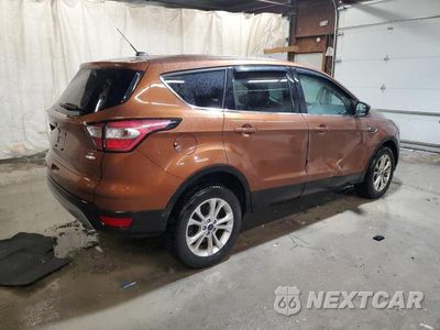 Trzecie zdjęcie samochodu z tyłu: 2017 FORD ESCAPE SE VIN:1FMCU9GD9HUE68081 - miniatura