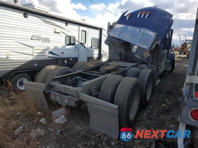 Czwarte zdjęcie samochodu z boku: 2019 KENWORTH CONSTRUCTION W900 VIN:1XKWD49X3KJ257015 - miniatura
