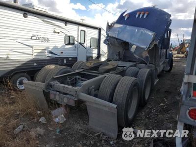 Czwarte zdjęcie samochodu z boku: 2019 KENWORTH CONSTRUCTION W900 VIN:1XKWD49X3KJ257015 - miniatura