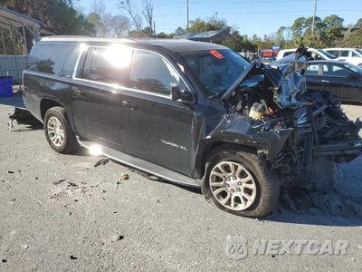 Czwarte zdjęcie samochodu z boku: 2018 GMC YUKON XL C1500 SLT VIN:1GKS1GKC6JR333696 - miniatura