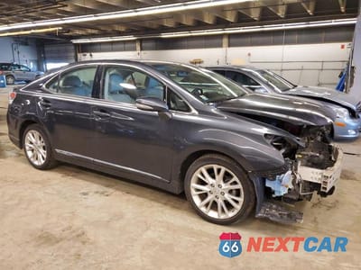 Czwarte zdjęcie samochodu z boku: 2010 LEXUS HS 250H VIN:JTHBB1BA3A2011562 - miniatura