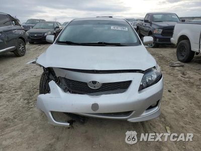 Piąte zdjęcie samochodu w środku: 2010 TOYOTA COROLLA BASE VIN:1NXBU4EE1AZ355595 - miniatura