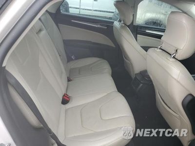 Zdjęcie 10 z 13 samochodu: 2014 FORD FUSION TITANIUM PHEV VIN:3FA6P0SU0ER227952 - miniatura