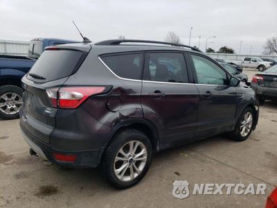 Trzecie zdjęcie samochodu z tyłu: 2018 FORD ESCAPE SEL VIN:1FMCU9H9XJUC15688 - miniatura