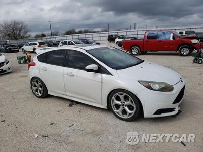 Czwarte zdjęcie samochodu z boku: 2013 FORD FOCUS ST VIN:1FADP3L98DL136105 - miniatura
