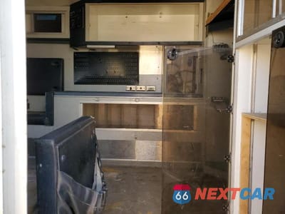 Zdjęcie 11 z 13 samochodu: 1999 FORD ECONOLINE E450 SUPER DUTY CUTAWAY VAN RV VIN:1FDXE40F1XHB67955 - miniatura
