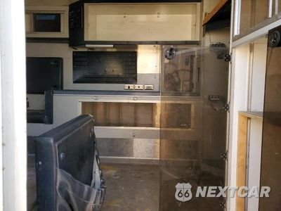 Zdjęcie 11 z 13 samochodu: 1999 FORD ECONOLINE E450 SUPER DUTY CUTAWAY VAN RV VIN:1FDXE40F1XHB67955 - miniatura