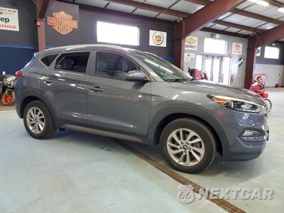 Czwarte zdjęcie samochodu z boku: 2016 HYUNDAI TUCSON LIMITED VIN:KM8J3CA47GU124828 - miniatura