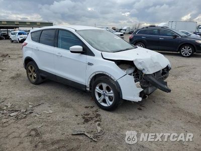 Czwarte zdjęcie samochodu z boku: 2015 FORD ESCAPE SE VIN:1FMCU0G92FUB41851 - miniatura