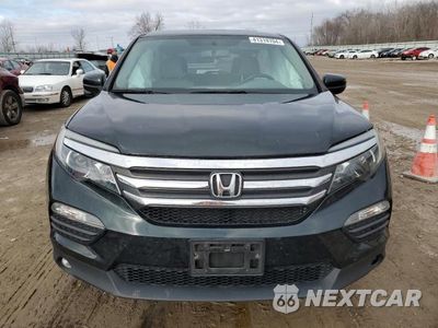 Piąte zdjęcie samochodu w środku: 2018 HONDA PILOT EXL VIN:5FNYF6H58JB046490 - miniatura