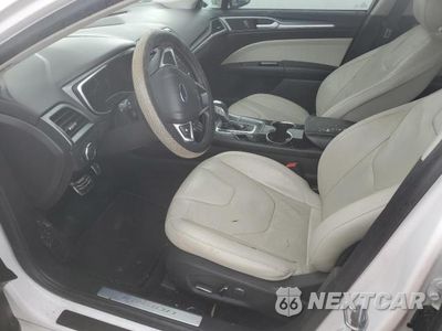 Zdjęcie 7 z 13 samochodu: 2014 FORD FUSION TITANIUM PHEV VIN:3FA6P0SU0ER227952 - miniatura