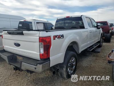 Czwarte zdjęcie samochodu z boku: 2019 FORD F350 SUPER DUTY VIN:1FT8W3BT1KED09878 - miniatura