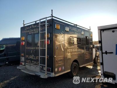 Trzecie zdjęcie samochodu z tyłu: 1999 FORD ECONOLINE E450 SUPER DUTY CUTAWAY VAN RV VIN:1FDXE40F1XHB67955 - miniatura