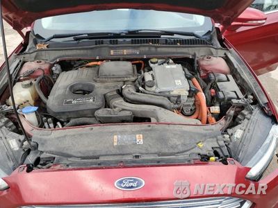 Zdjęcie 11 z 12 samochodu: 2013 FORD FUSION SE PHEV VIN:3FA6P0PU0DR252745 - miniatura