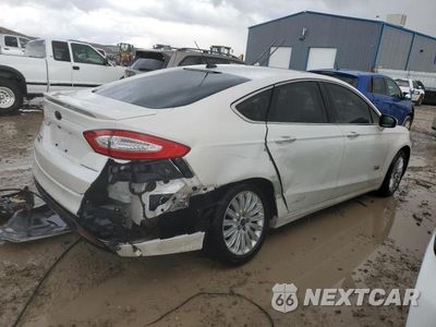 Trzecie zdjęcie samochodu z tyłu: 2014 FORD FUSION TITANIUM PHEV VIN:3FA6P0SU0ER227952 - miniatura