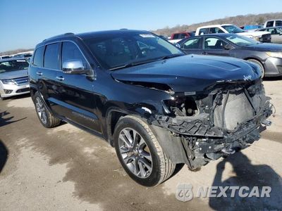 Czwarte zdjęcie samochodu z boku: 2017 JEEP GRAND CHEROKEE OVERLAND VIN:1C4RJFCG9HC876284 - miniatura