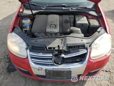 Zdjęcie 11 z 12 samochodu: 2009 VOLKSWAGEN JETTA SE VIN:3VWRZ71K09M058042 - miniatura
