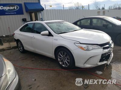 Czwarte zdjęcie samochodu z boku: 2016 TOYOTA CAMRY HYBRID VIN:4T1BD1FK3GU177457 - miniatura