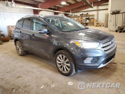 Czwarte zdjęcie samochodu z boku: 2018 FORD ESCAPE TITANIUM VIN:1FMCU9J93JUB98940 - miniatura