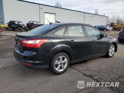 Trzecie zdjęcie samochodu z tyłu: 2014 FORD FOCUS SE VIN:1FADP3F29EL462060 - miniatura