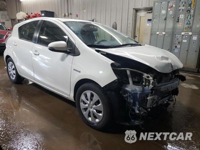 Czwarte zdjęcie samochodu z boku: 2014 TOYOTA PRIUS C VIN:JTDKDTB34E1079518 - miniatura