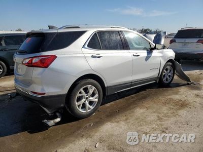 Trzecie zdjęcie samochodu z tyłu: 2020 CHEVROLET EQUINOX LT VIN:2GNAXLEX5L6138479 - miniatura