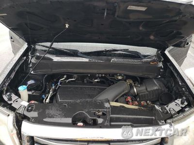Zdjęcie 12 z 14 samochodu: 2012 HONDA PILOT EXLN VIN:5FNYF3H77CB031014 - miniatura