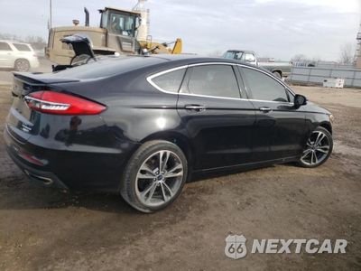 Trzecie zdjęcie samochodu z tyłu: 2020 FORD FUSION TITANIUM VIN:3FA6P0D99LR130982 - miniatura