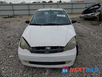 Piąte zdjęcie samochodu w środku: 2003 FORD FOCUS ZX3 VIN:3FAFP31303R185001 - miniatura