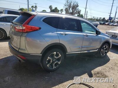 Trzecie zdjęcie samochodu z tyłu: 2017 HONDA CR-V TOURING VIN:2HKRW2H9XHH610071 - miniatura